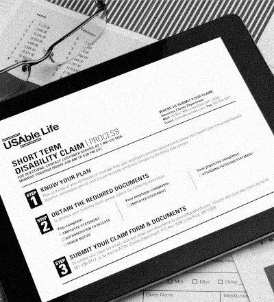 USAble Claims short term disability claim process displayed on a tablet